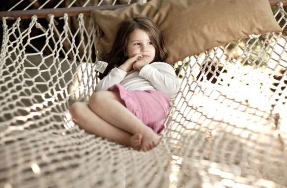 Serene Moments of a Child in a Hammock wallpapers hd quality