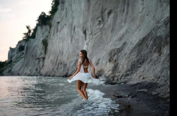 Serene Shoreline Woman -