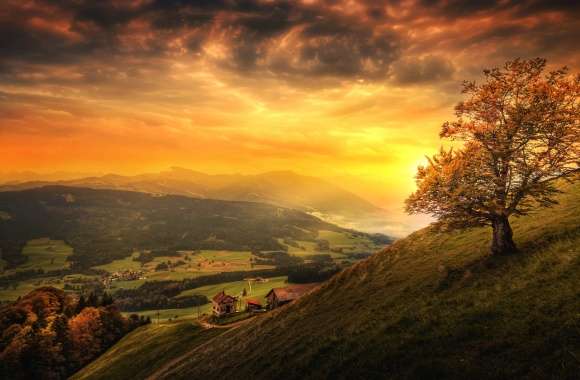 Serene Sunset Over Swiss Hills -