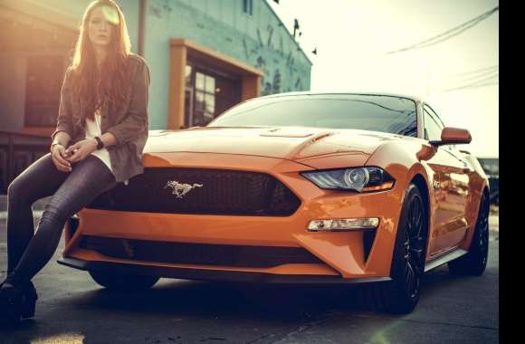 Stylish Redhead with Orange Ford Mustang -