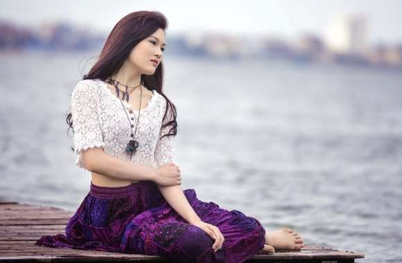 Tranquil Waterfront Asian Woman